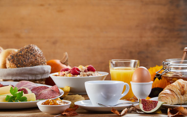 Side view of table with breakfast meal