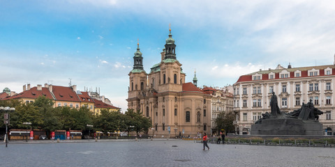 Jan Hus monument and the St. Nicholas' Church in Prague