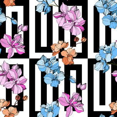 Vector Pink and blue orchid flower. Engraved ink art. Seamless background pattern. Fabric wallpaper print texture.