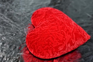 Valentine's day red heart on a silver background