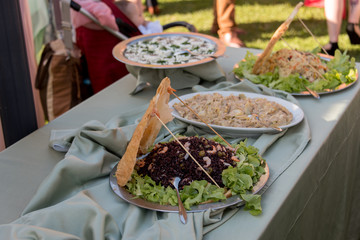 table with buffet and aperitifs for wedding ceremony