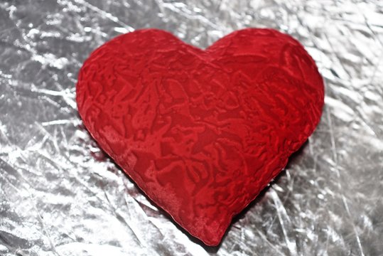 Valentine's day red heart on a silver background