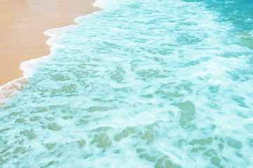 Soft wave of ocean on the sandy beach