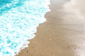 Soft wave of ocean on the sandy beach