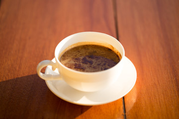 coffee cup  on wood table.