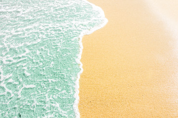 Soft wave of ocean on the sandy beach