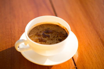 coffee cup  on wood table.