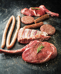 Assorted raw meat with spices