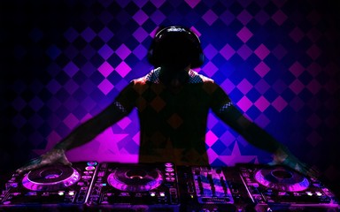 Obraz na płótnie Canvas Young headphones dj nightlife entertainment concepts equipment