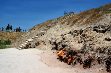 Yanar Dag (means"burning mountain") is a natural gas fire which blazes continuously on a hillside on the Absheron Peninsula, Caspian Sea near Baku,famous landmark of Azerbaijan