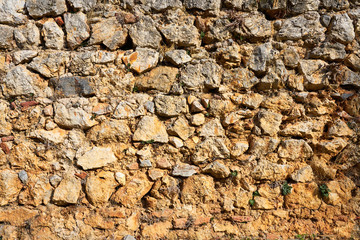 An old times stone wall texture background.