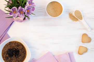flowers , cookies and porridge of amaranth with prunes