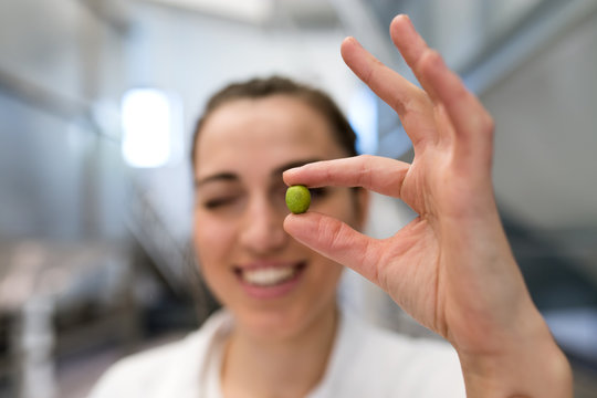 Detail of an olive portrait of young woman background