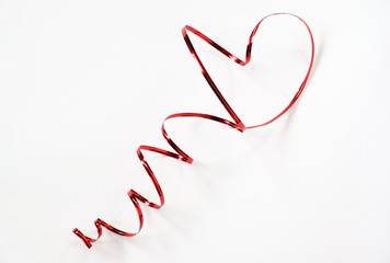 Beautiful luxury red heart shape from wire ribbon on white background use for valentines ‘s day concept.