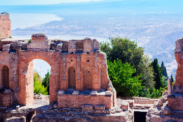 Fototapeta na wymiar The ruins of amphitheatre in Taormina, Sicily, Italy.