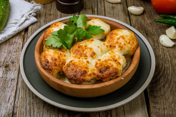mushrooms baked with Suluguni cheese