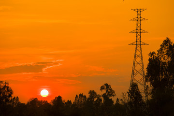 High voltage tower and sunset,New Electric Transmission Towers,Electric pole background during construction 