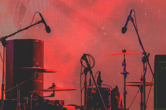 Silhouette set of musical instruments during concert.