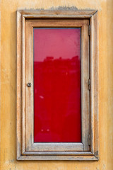 Obraz na płótnie Canvas Red panel framed with wood