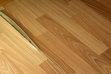 The linoleum has spread along the seam at the place of gluing