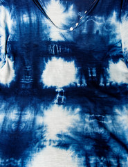 home made cotton fabric batiked with indigo - close up