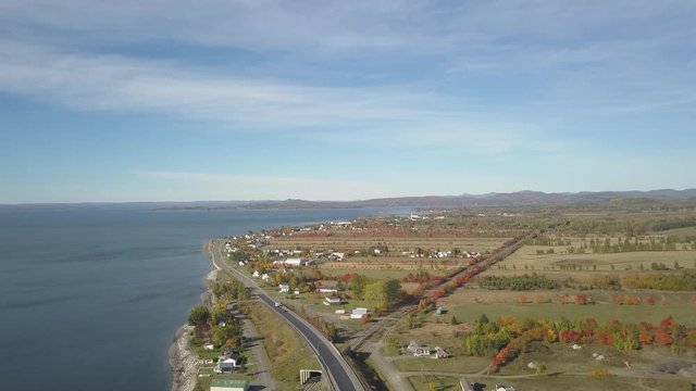 Aerial view of the Atlantic Ocean Coast during a sunny morning. Taken near Carleton, Quebec, Canada.