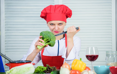 Woman professional chef hold raw broccoli vegetable. Free healthy vegetarian and vegan recipes. How...
