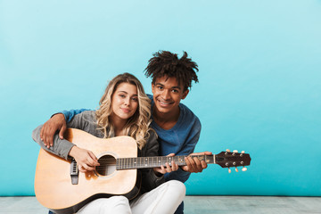 Happy young multiethninc couple together