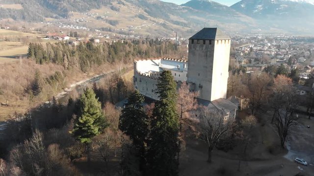 Aerial view of Lienz Castle and valley in winter season, Austria