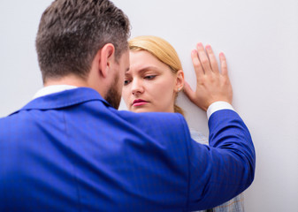 Touch knee. Protection female rights. Workplace bullying concept.