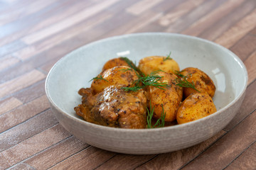 Piece of roasted pork and potatoes