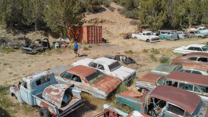 UTAH, USA - JUNE 2018: Vintage old cars in abandoned car parking lot in the countryside