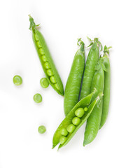 green peas in pods on a white background