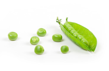 green peas in pods on a white background