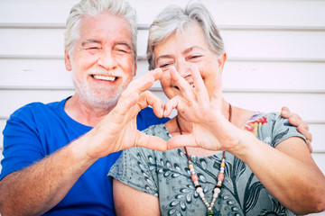 Love and valentine's day concept for cheerful happy couple of senior man and woman caucasian people...