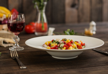 salad fresh vegetables (tomato, cucumber, radish, pepper, arugula and other vegetables). copy space. top