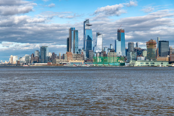 Hudson Yards skyscrapers and Manhattan skyline in New York City as seen from Jersey City - obrazy, fototapety, plakaty