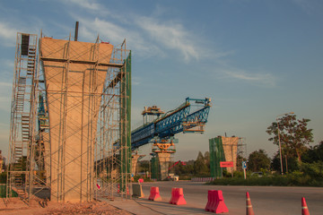 Construction crane and girder of bridge construction site.New expressway construction site and...