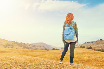 Beauty woman outdoors enjoying nature.