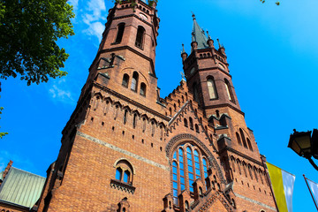 Fototapeta na wymiar Tarnow, Poland - May 01, 2014: Exterior of the Gothic Catholic Church of the Holy Family