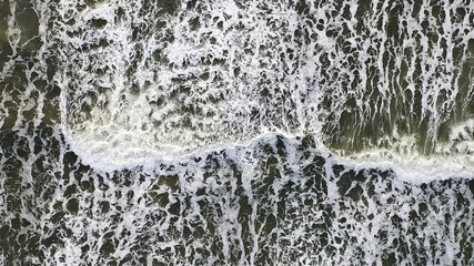Aerial overhead view of beautiful breaking ocean waves