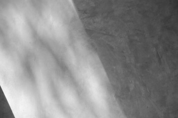 Abstract background of a white wall with shadows from the window. - monochrome
