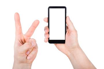A man holding smartphone in hand and other hand showing two fingers up in the peace or victory symbol