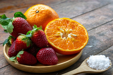 Fototapeta na wymiar strawberry and orange fruit vitamin diet for healthy