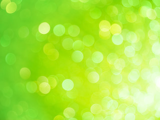 Fototapeta na wymiar Green blured abstract background with bokeh