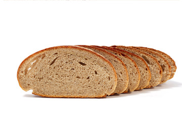 Slices of rye bread isolated on white background. Many pieces.