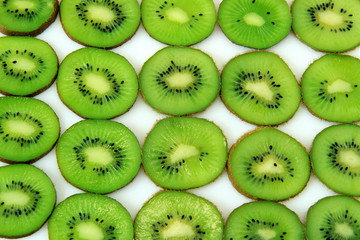 slice of kiwi on white background