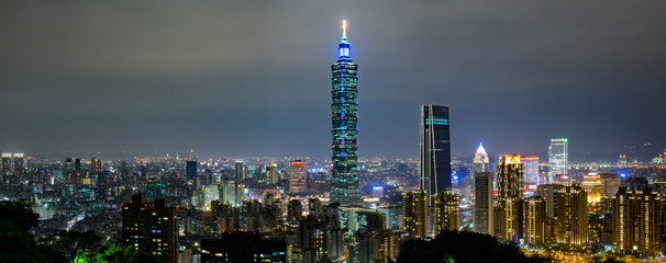 Panoramic of Taipei city skyline at night in Taipei, Taiwan.