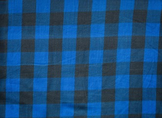Hipster checkered black and blue cotton fabric texture