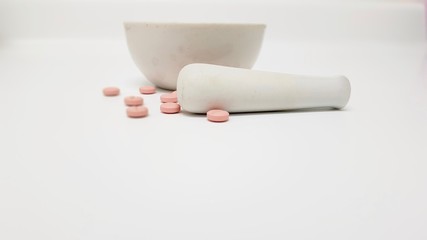 Pink tablets and mortar